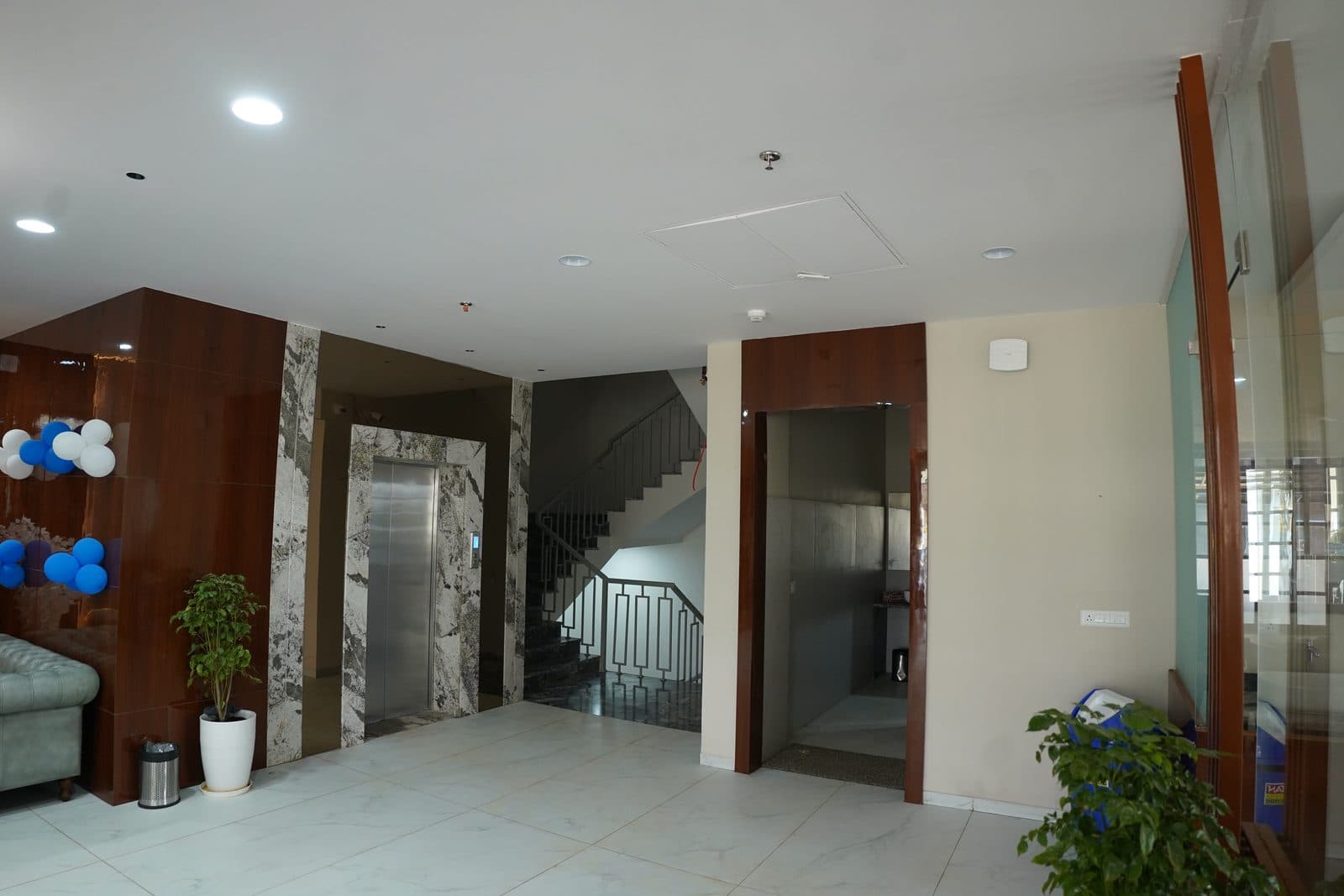 Lobby staircase and elevator