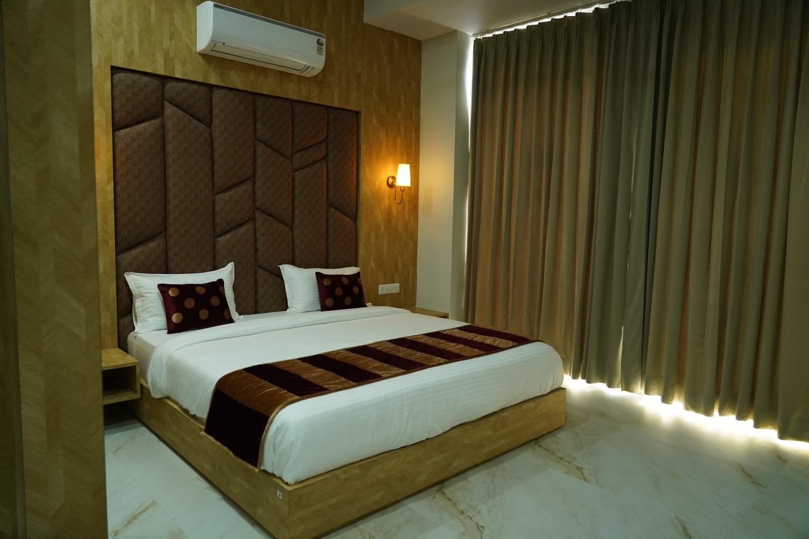 Suite bedroom with leather headboard