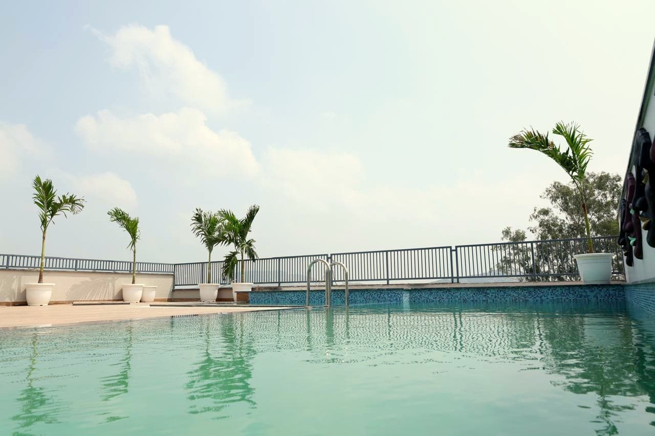 Rooftop pool with steel railing